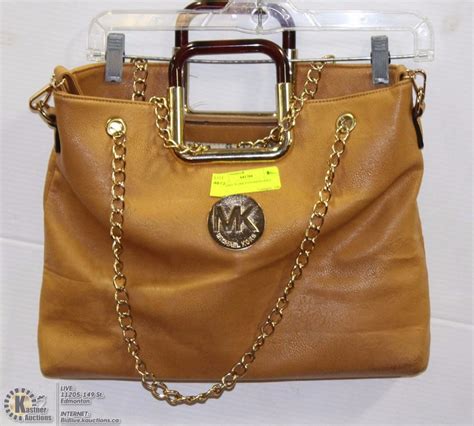 replica michael kors bags uk|Michael Kors bag logo.